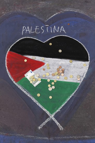 Palestinian flag painted as a heart on the street