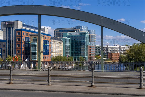 Bridge arch of the Lessingrbuecke with the office complexes at the Spreebogen