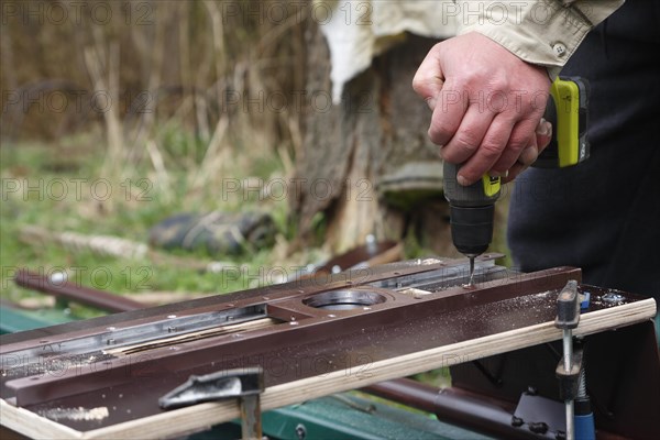 Conversion work for a kayak to meet the needs of a nature photographer