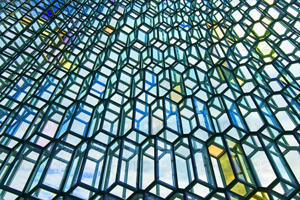 Colourful glass facade of the Harpa Concert Hall and conference centre in the capital city Reykjavik