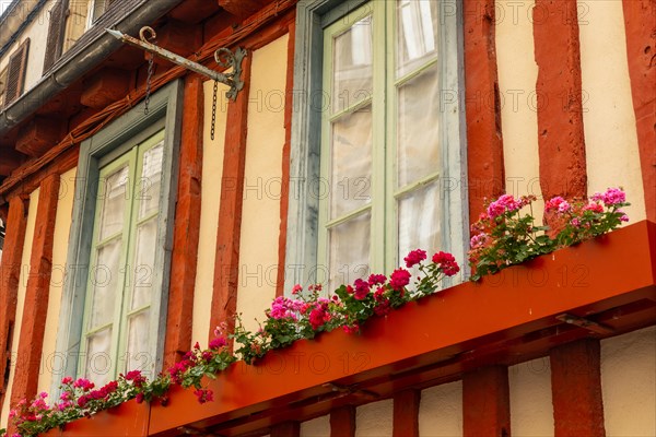 Old wooden colored houses in the medieval village of Quimper in the Finisterre department. French Brittany