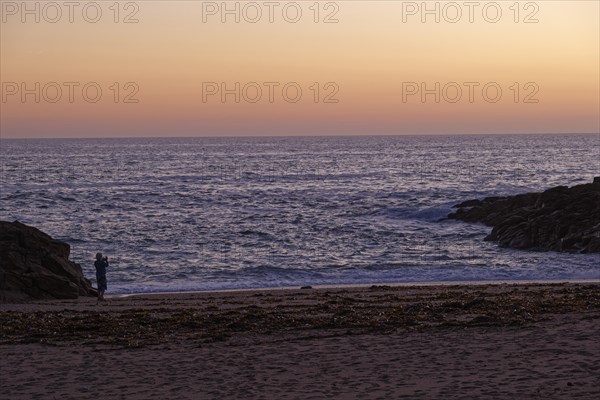 Evening atmosphere on the Cote Sauvage. The Wild Coast is a rocky coast in the west of the Quiberon peninsula in Brittany. Cores