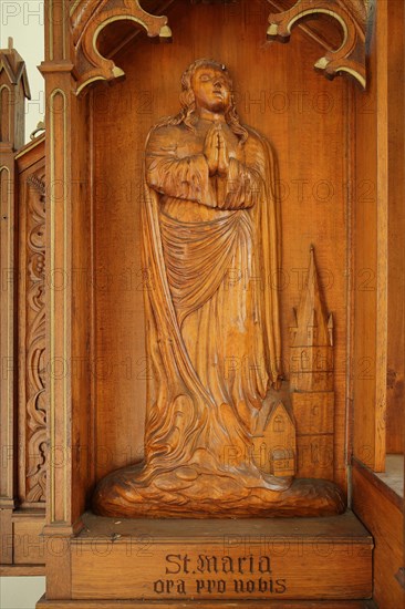 Saint Mary sculpture with inscription
