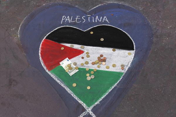 Palestinian flag painted as a heart on the street