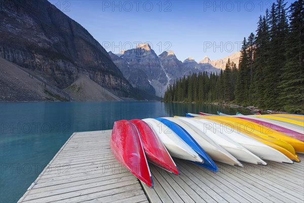 Colourful canoes at Moraine Lake in the Valley of the Ten Peaks