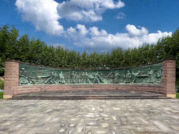 Crucible Casting Monument Monument in the form of panorama semicircle by sculptor Artur Hoffmann from 1952 for steelworkers of Krupp Stahl Stahlwerke depiction semi relief of manufacture production of crucible steel crucible steel production