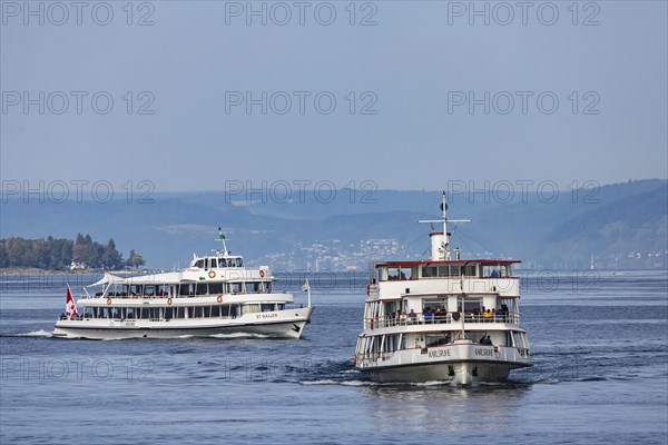 The excursion boats ST. GALLEN and KARLSRUHE underway on Lake Constance against the backdrop of Birnau Abbey