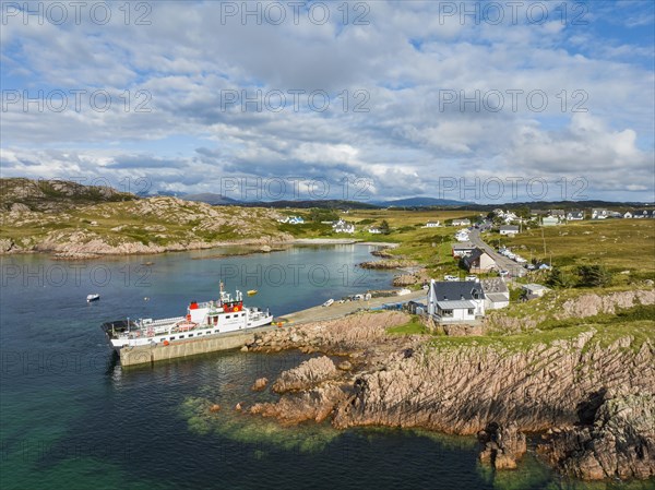 Aerial view of the Fionnphort ferry terminal with the ferry MV Loch Buie of the shipping company Caledonian MacBrayne operating a scheduled service between Fionnphort and the Isle of Iona