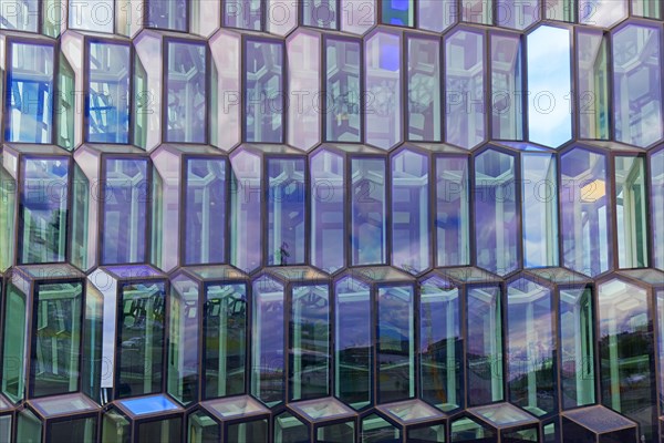 Colourful glass facade of the Harpa Concert Hall and conference centre in the capital city Reykjavik