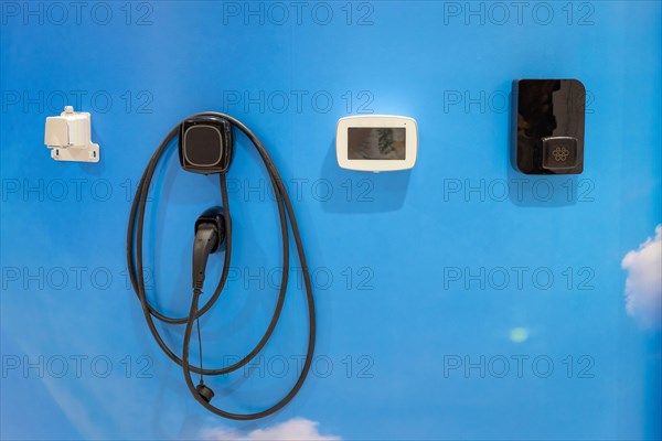 Chargers integrated into the wall at the exhibition of modern technologies. Mid shot