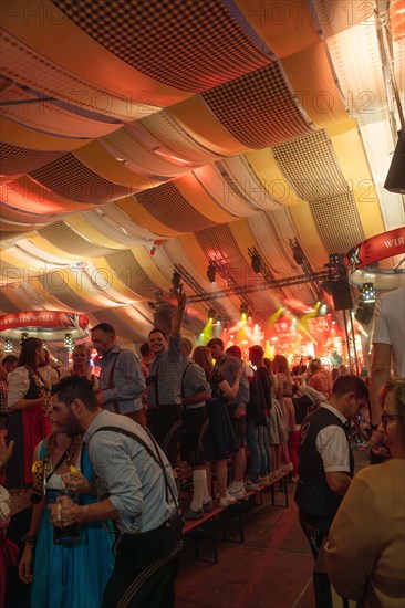 Beer tent full of drunken people