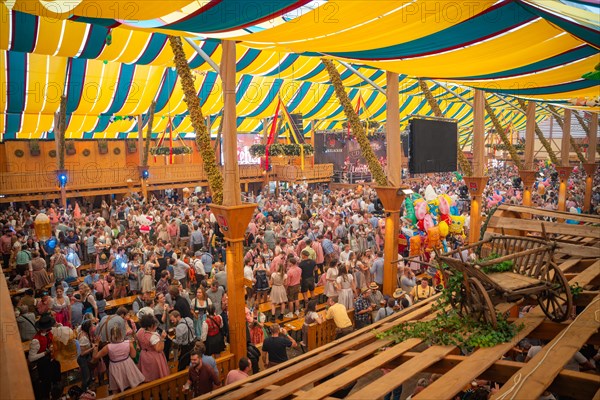 Beer tent full of drunken people