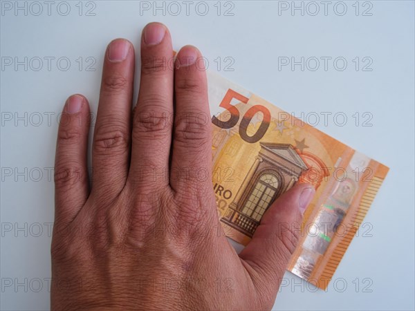 Symbolic photo on the subject of cash