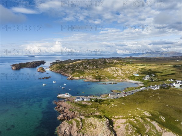 Aerial view of Fionnphort Bay with ferry pier and the ferry MV Loch Buie operating a scheduled service between Fionnphort and the Isle of Iona