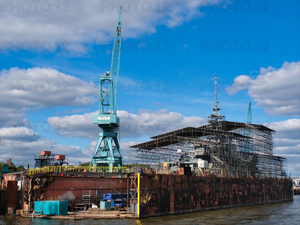 Warship in the shipyard in the port of Hamburg