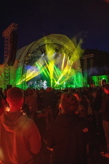 Cheering crowd at Live Klostersommer Festival in Historic Monastery