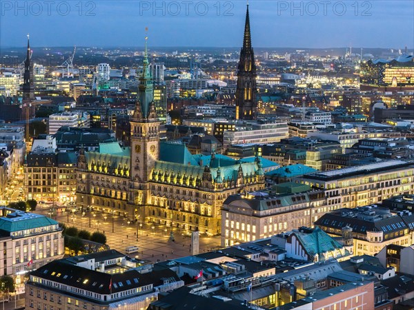 Aerial view of City Hall and Elbe Philharmonic Hall in the evening
