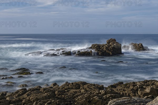 Surf on the rocky coast off Penmarch on the Atlantic Ocean. Brittany