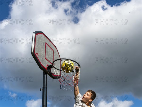 Basketball Jump with the ball to the basket and net