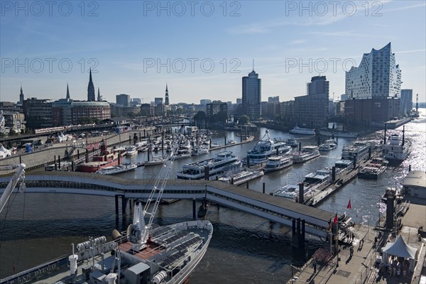 View of Niederhafen harbour and the museum ship Cap San Diego at the Ueberseebruecke bridge in the Port of Hamburg from a cruise ship