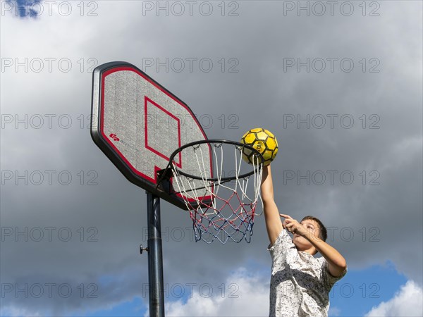 Basketball Jump with the ball to the basket and net