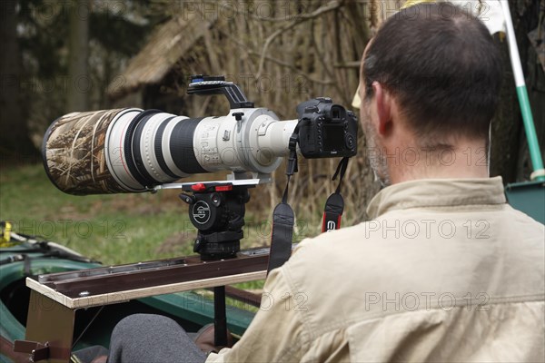 Conversion work for a kayak to meet the needs of a nature photographer