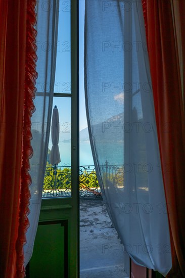 Balcony View from The Historical Grandhotel Giessbach with View over Mountain and Lake Brienz with Sunlight in Giessbach