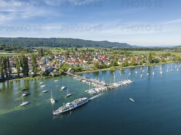 Aerial view of the jetty and marina of the Lake Constance municipality of Iznang on the Hoeri peninsula with the cruise ship MS Reichenau