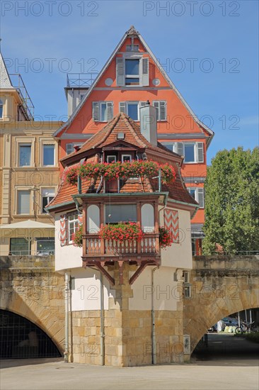 Bridge pier cottage with oriel