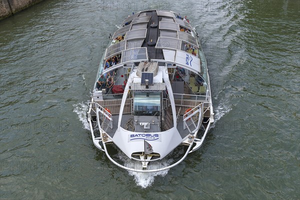 Tourist ship with glass roof on the Seine