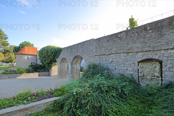 Historic city wall with archway