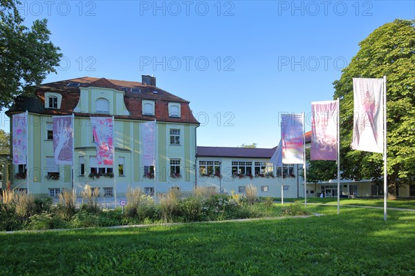 Adult education centre Villa Arnold built 1905 with flags