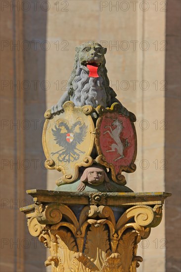 Lion figure with shield