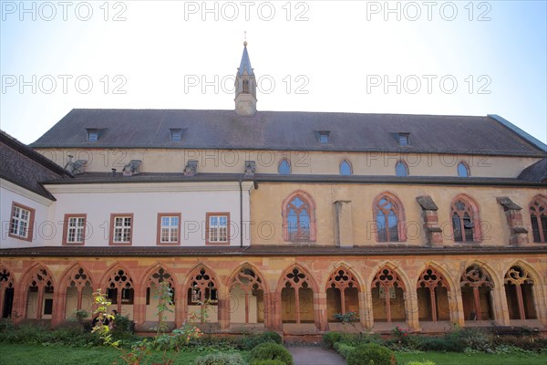 Inner courtyard with cloister and tower spire of Augustinian monastery built 15th century