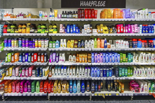 Shelves with hair care products