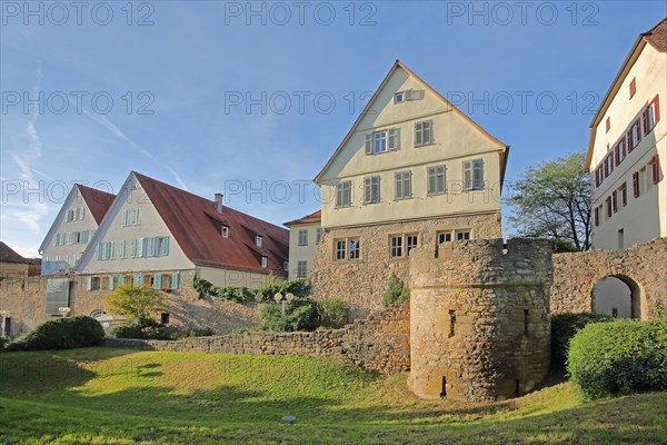 Historic town wall with tower and archway