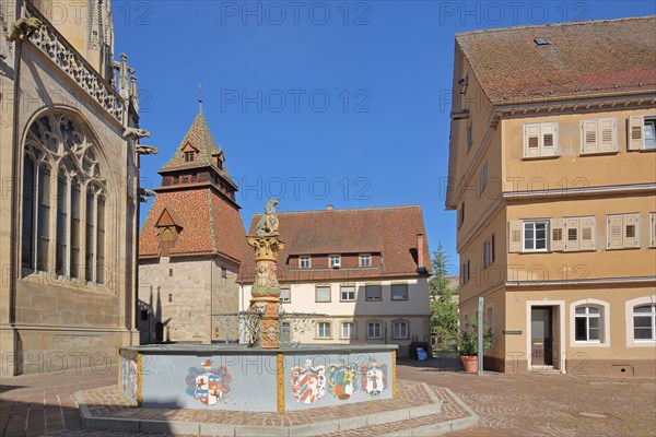 Lion fountain built in 1773 and historic Romanesque bell tower built in 1228