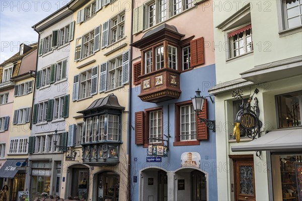 Guild houses and guild signs in the old town of Zurich