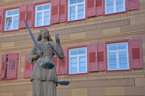 Sculpture Justitia with beam balance and sword