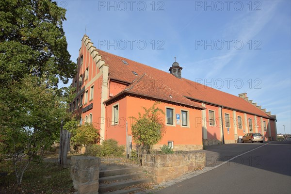 Red town hall with stepped gable