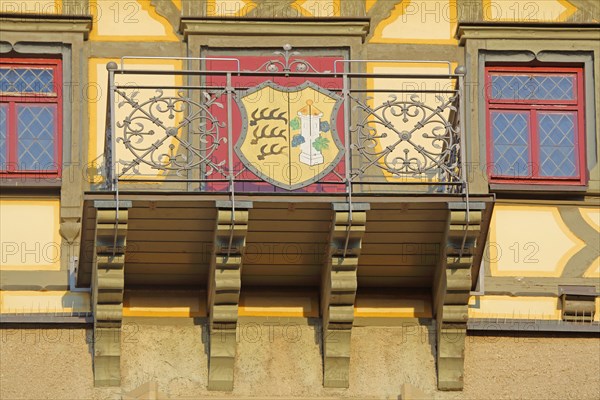Balcony with town coat of arms and metal railing from the Upper Gate Tower