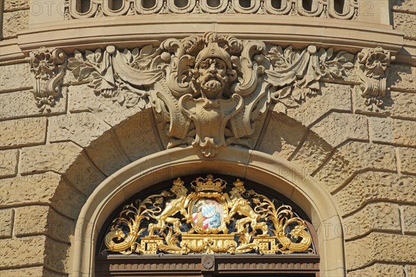 Coat of arms at the entrance to the district court built in 1903