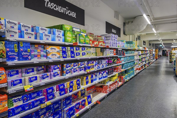 Shelves with paper handkerchiefs and nappies