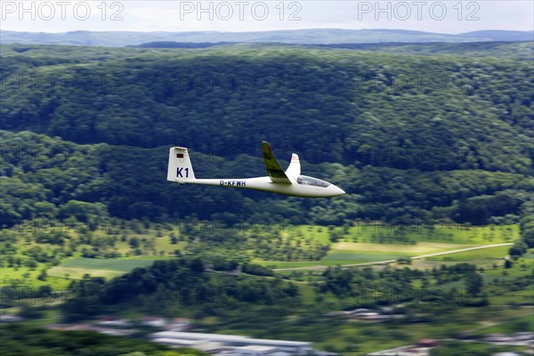 Glider flying over Unterlenningen in the Swabian Alb