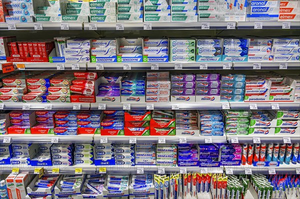 Shelves with toothpastes