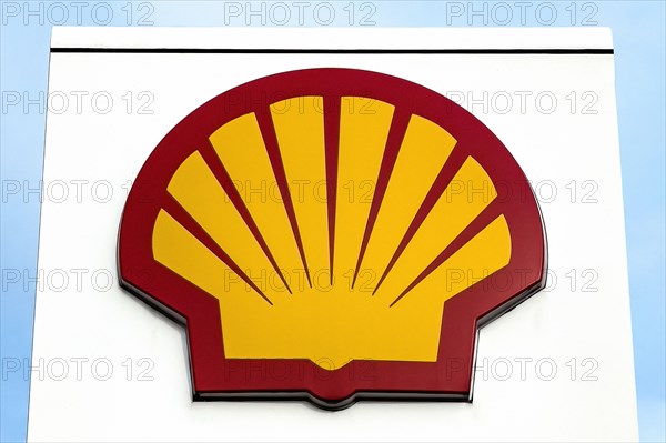 Logo in the shape of stylised scallop shell of oil company oil multinational petrol station operator for petrol diesel Shell at petrol station