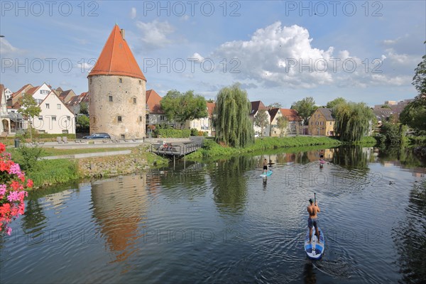 Powder tower built 1492 and Enz river with stand-up paddler and reflection