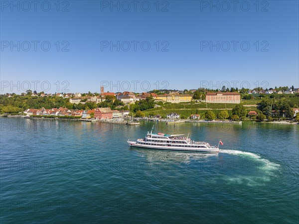Aerial view of the town of Meersburg and the departing cruise ship MS Vorarlberg