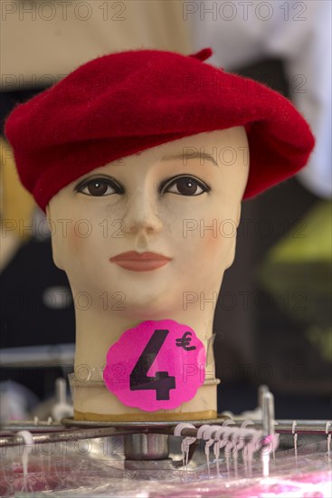 Doll's head with beret in a souvenir shop