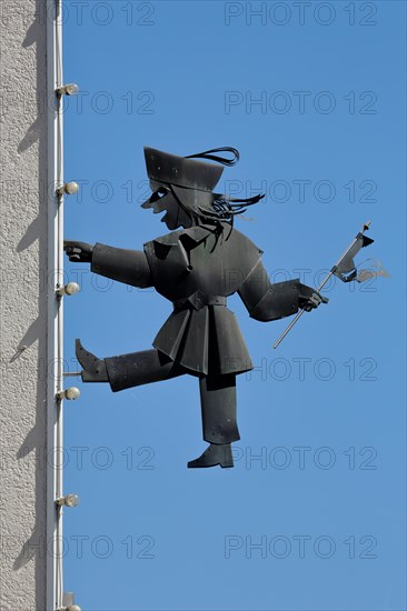 Sculpture Kasperl from Max and Moritz on a house wall